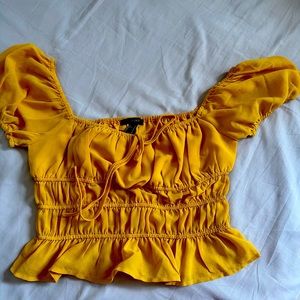 The shirt is very beautiful ,the size is M but it can fit a S